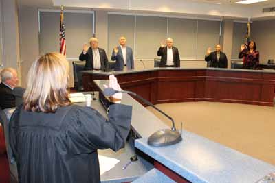 Kelley S. Powell, Henry County Probate Court Judge, swears in the Members of the HCWA Board of Directors for their terms in office during 2017